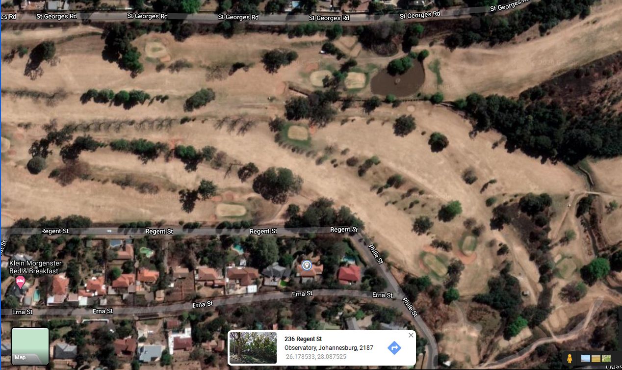 Aerial view of property relative to golf course